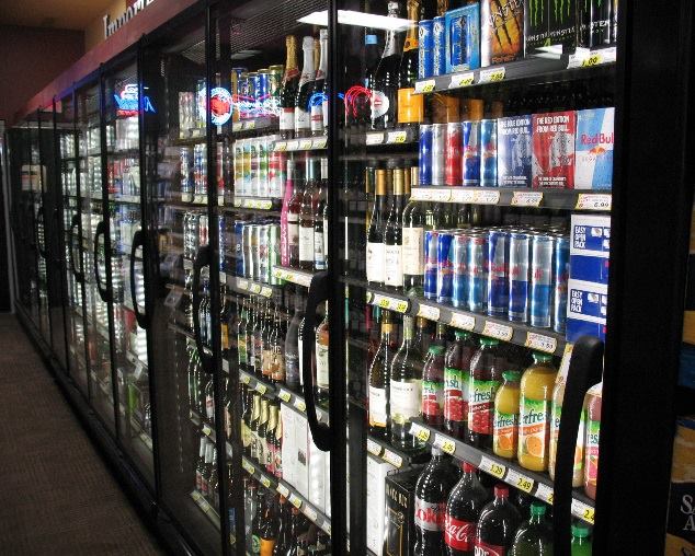 Various drinks in a refrigerator at a store